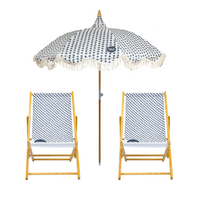 Wooden Beach chairs with polka dot fabric and matching umbrella comb, branded 'Splash & Ray'.