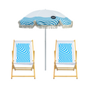 Two wooden deck chairs with blue and white geometric patterns and a matching umbrella with tassels.