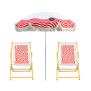 Beach umbrella and two wooden chairs with red and white geometric pattern
